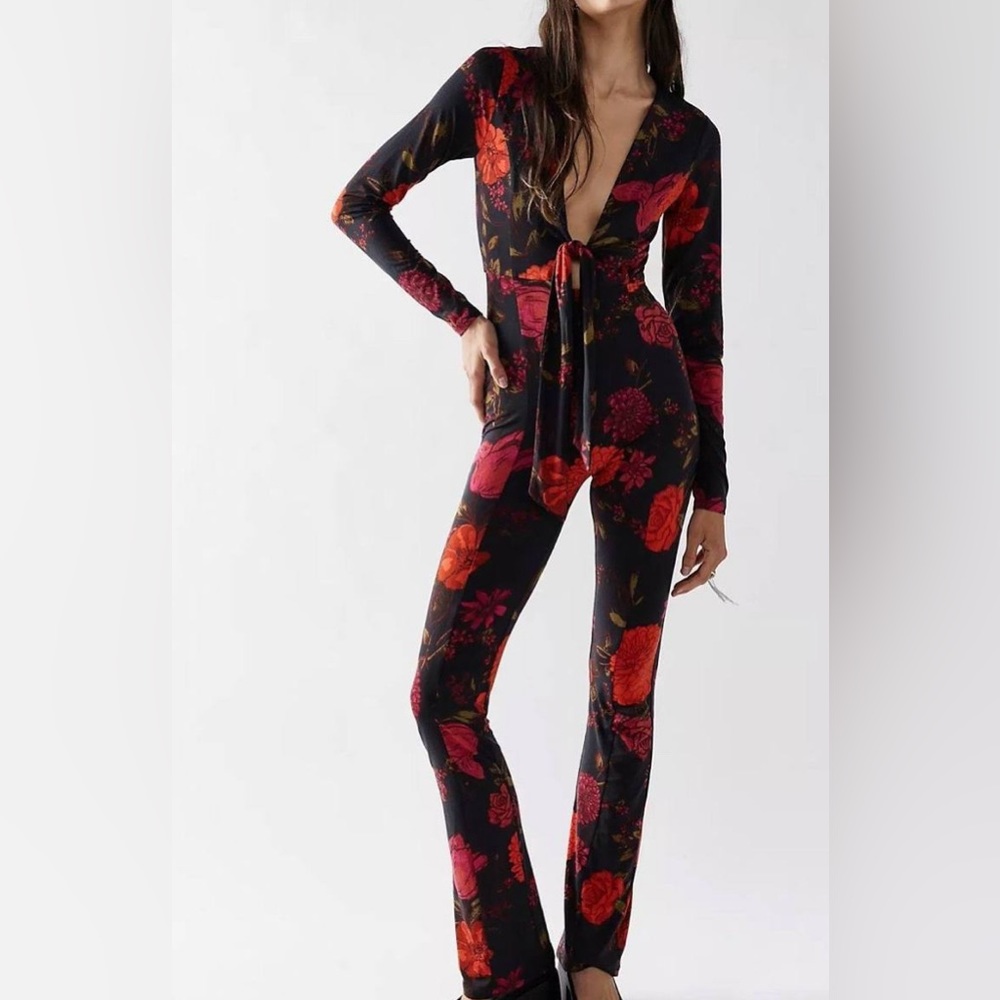 NWOT FREE PEOPLE jumpsuit long sleeve flare bottom stretchy size Large